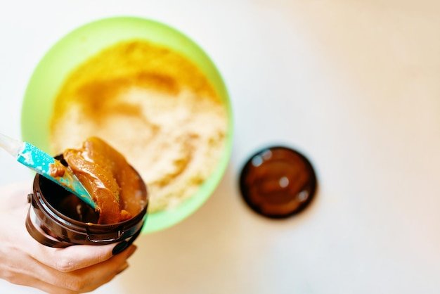 Close-up of hand holding ice cream