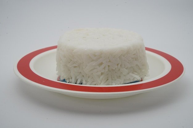 Close-up of ice cream in bowl over white background