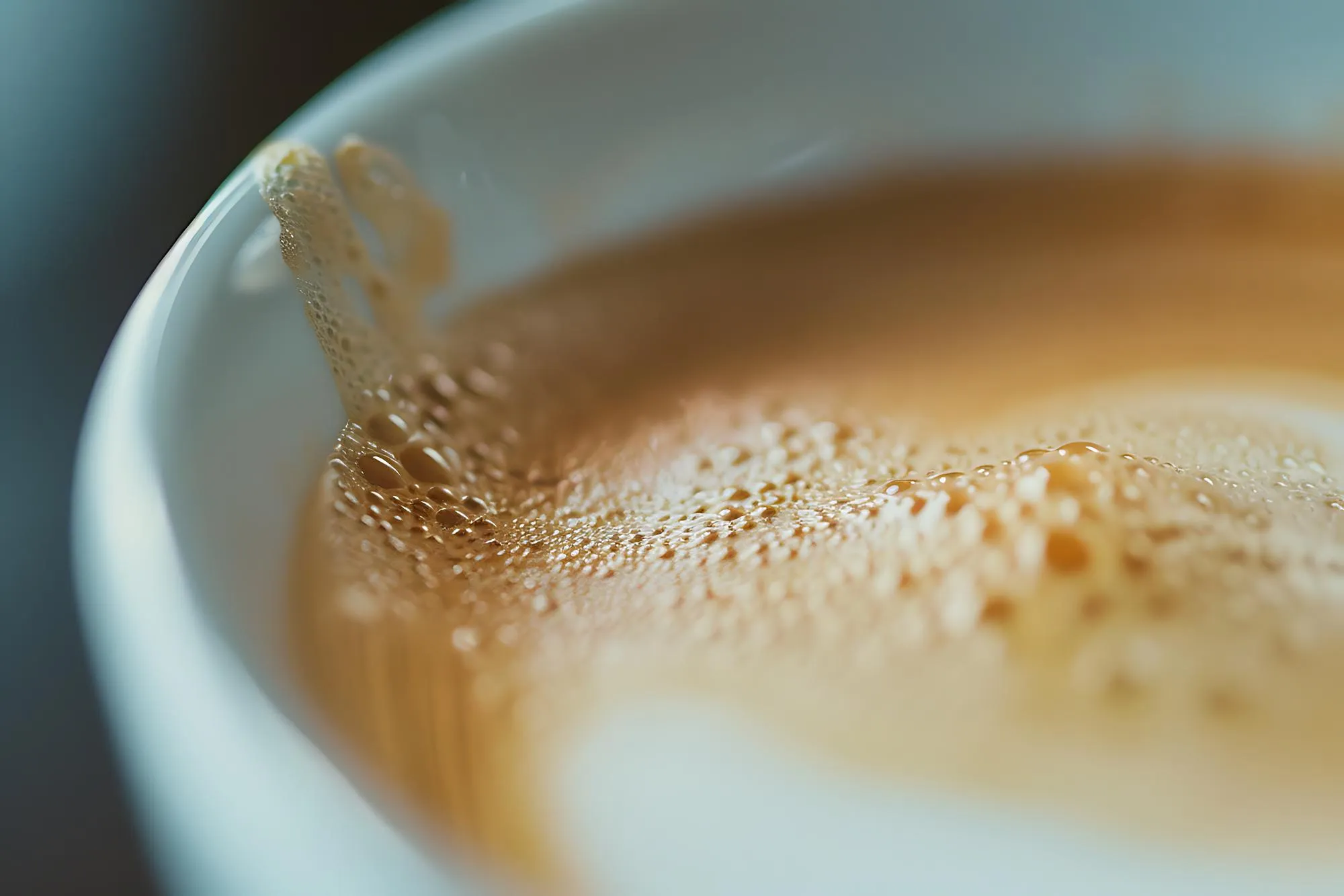 Closeup of Creamy Coffee Foam with Bubbles