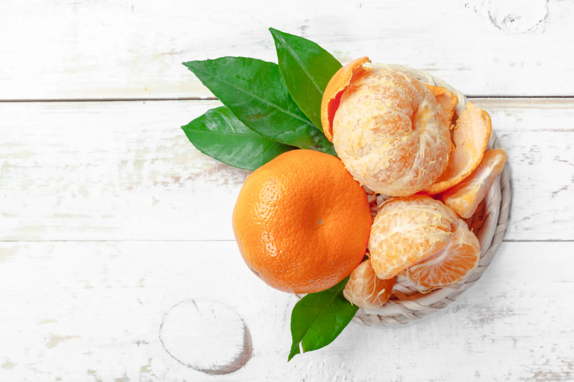 Fresh mandarines on wooden table
