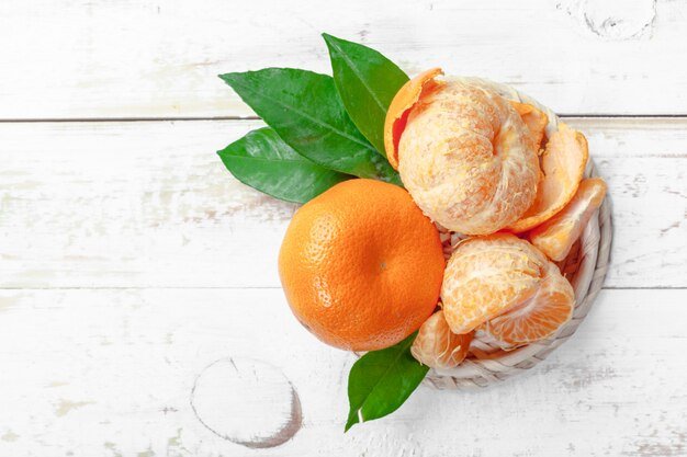 Fresh mandarines on wooden table