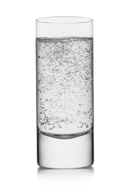 Highball glass with sparkling water drink on white