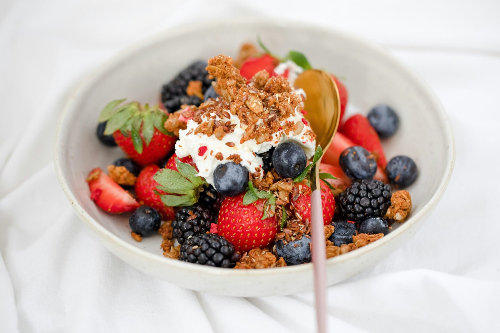 fruit salad on white ceramic bowl