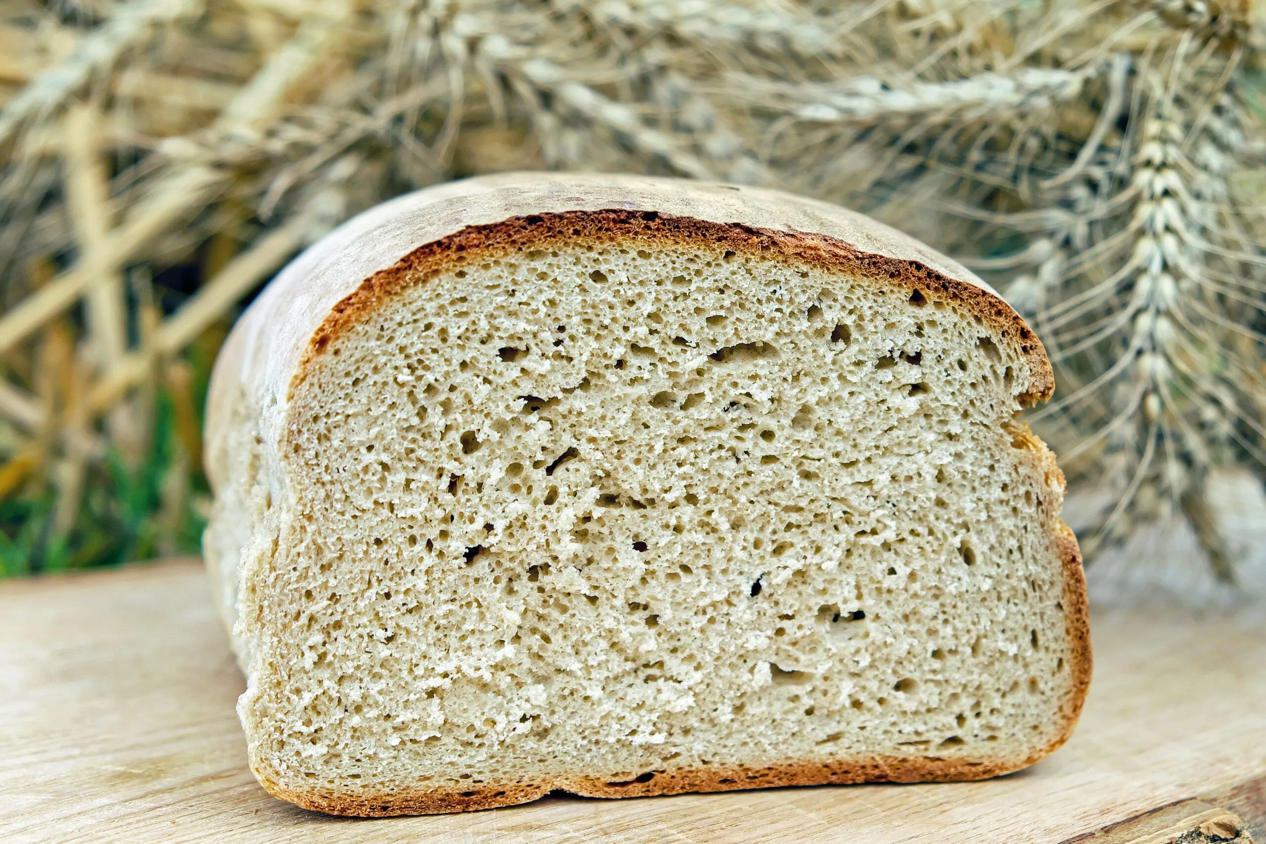 brown bread on white and brown textile