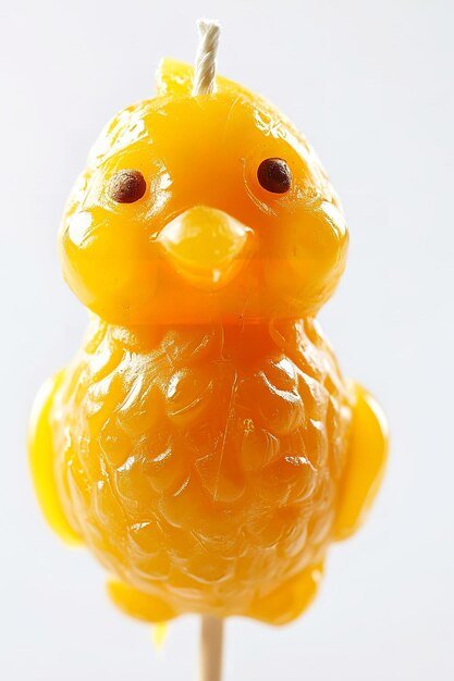 Beautiful Chick shaped Easter Candles isolated on white background