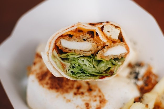 Burrito with grilled chicken and vegetables pita bread shawarma