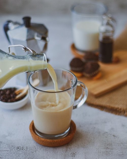Close-up of milk and coffee on table