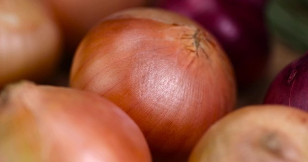 a closeup of golden yellow onions in the kitchen