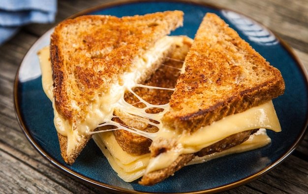 Crispy Grilled Cheese Sandwich with Melted Cheese Stretching Comfort Food Photography