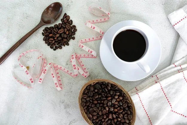 Cup of coffee and coffee beans background with measure tap on white desk Beverage and diet concept Directly above Flat lay Copy space
