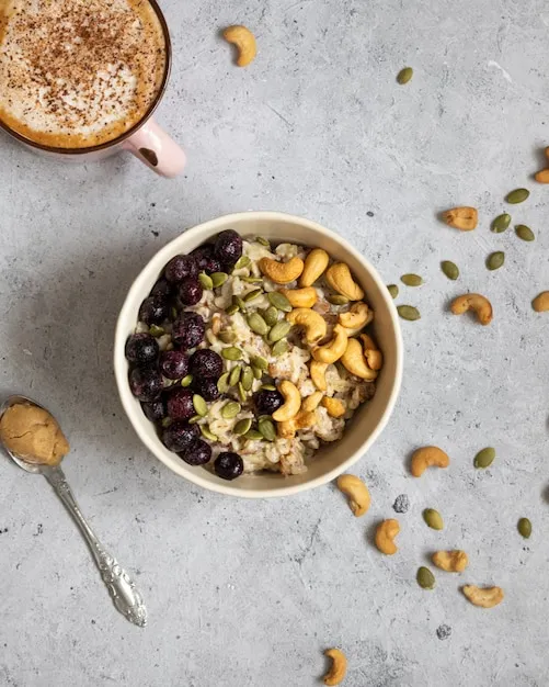 Delicious oatmeal porridge with berries for breakfast
