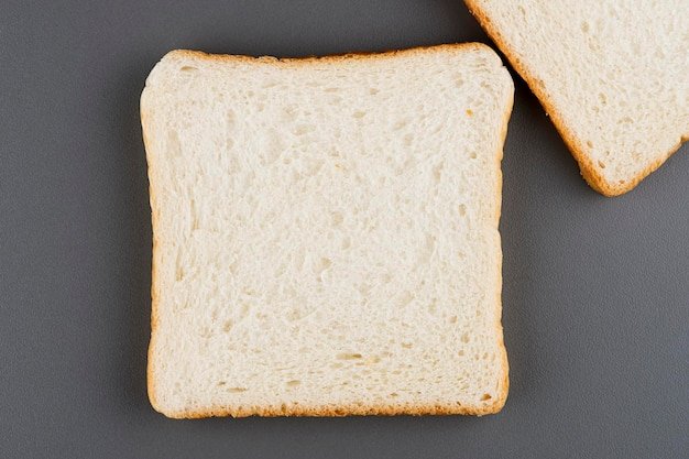 Directly above shot of breads on cutting board
