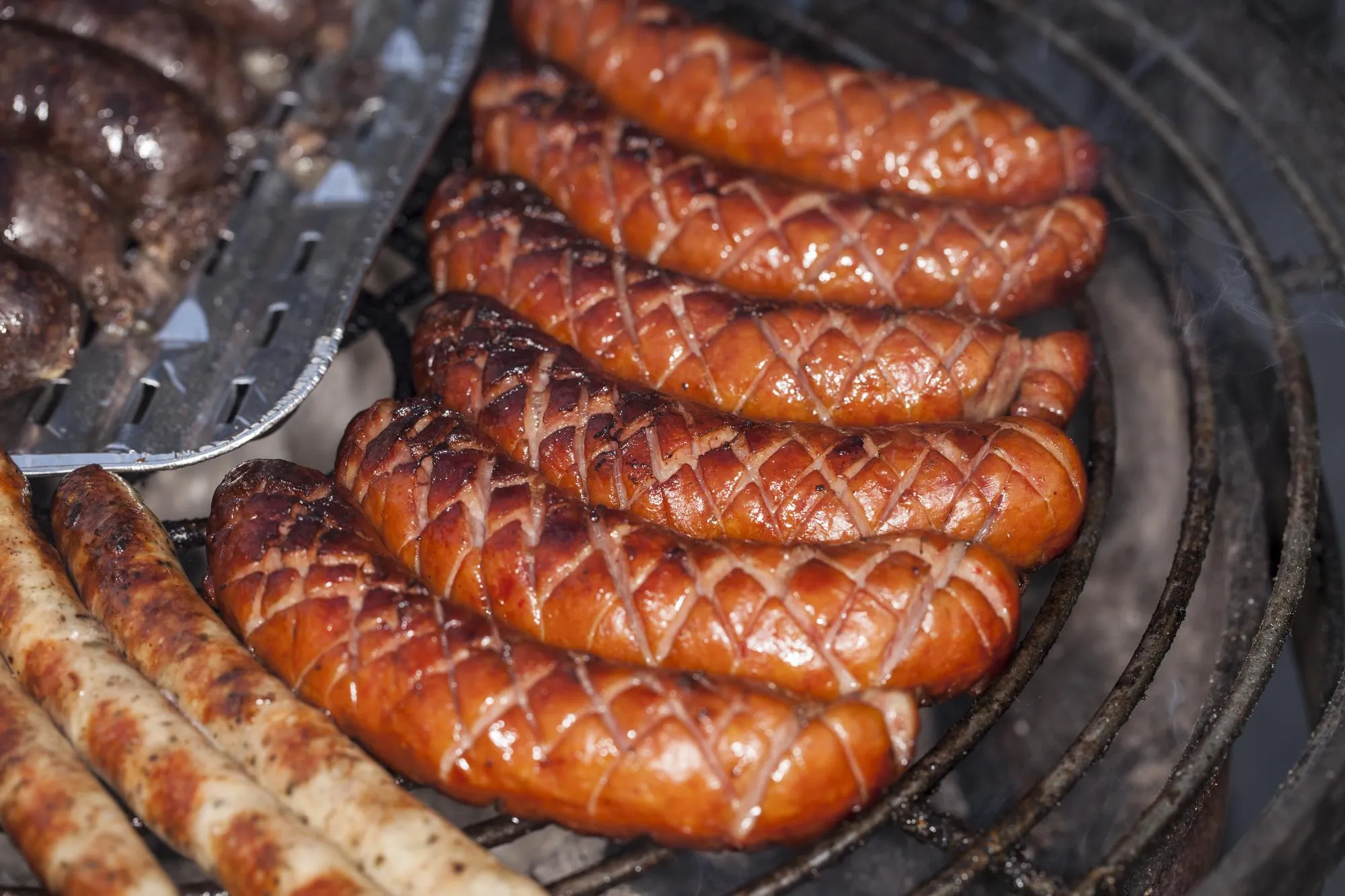 High angle view of meat on barbecue grill