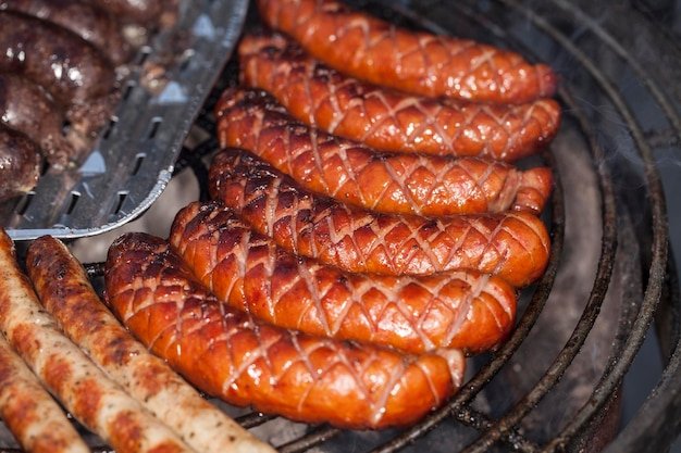 High angle view of meat on barbecue grill