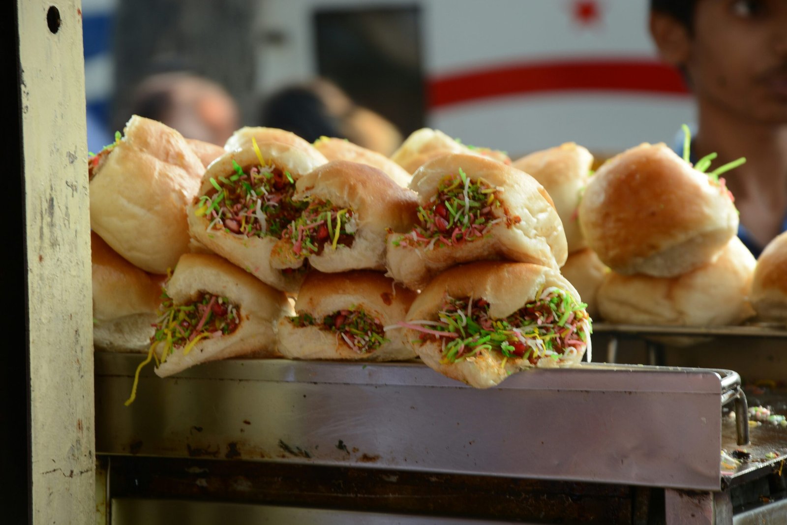 a pile of rolls sitting on top of a conveyor belt