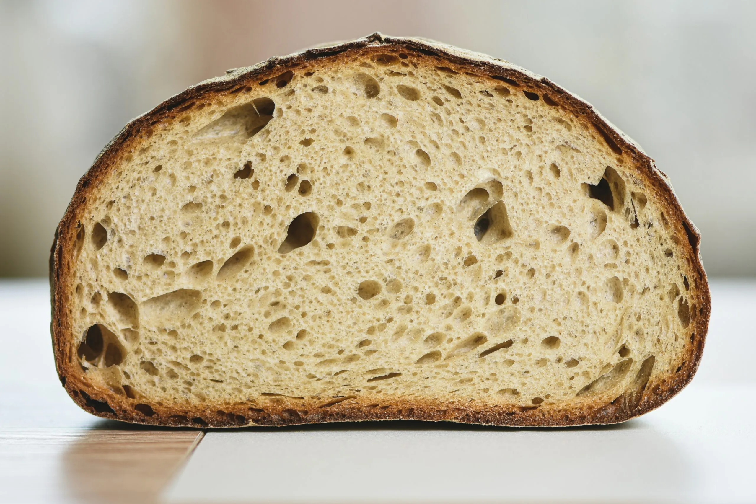 a close up of a piece of bread on a table