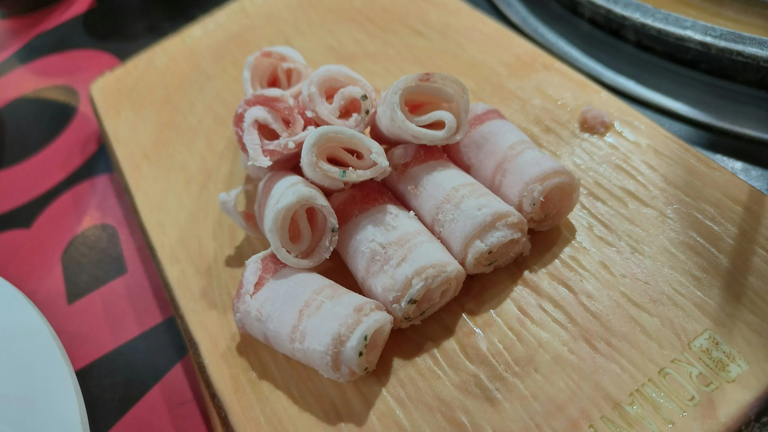 a bunch of food that is on a cutting board