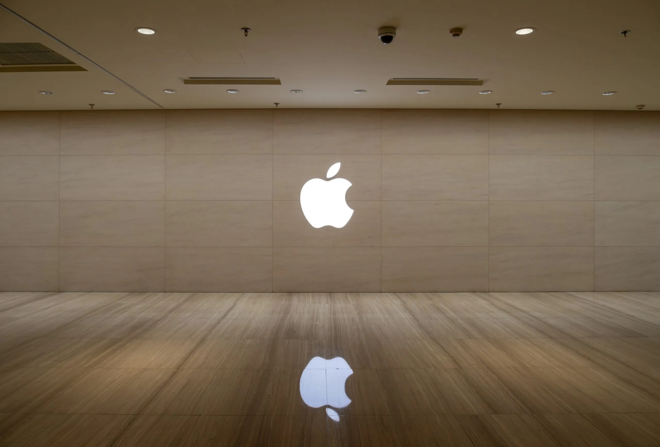 An image of an apple logo on a wall