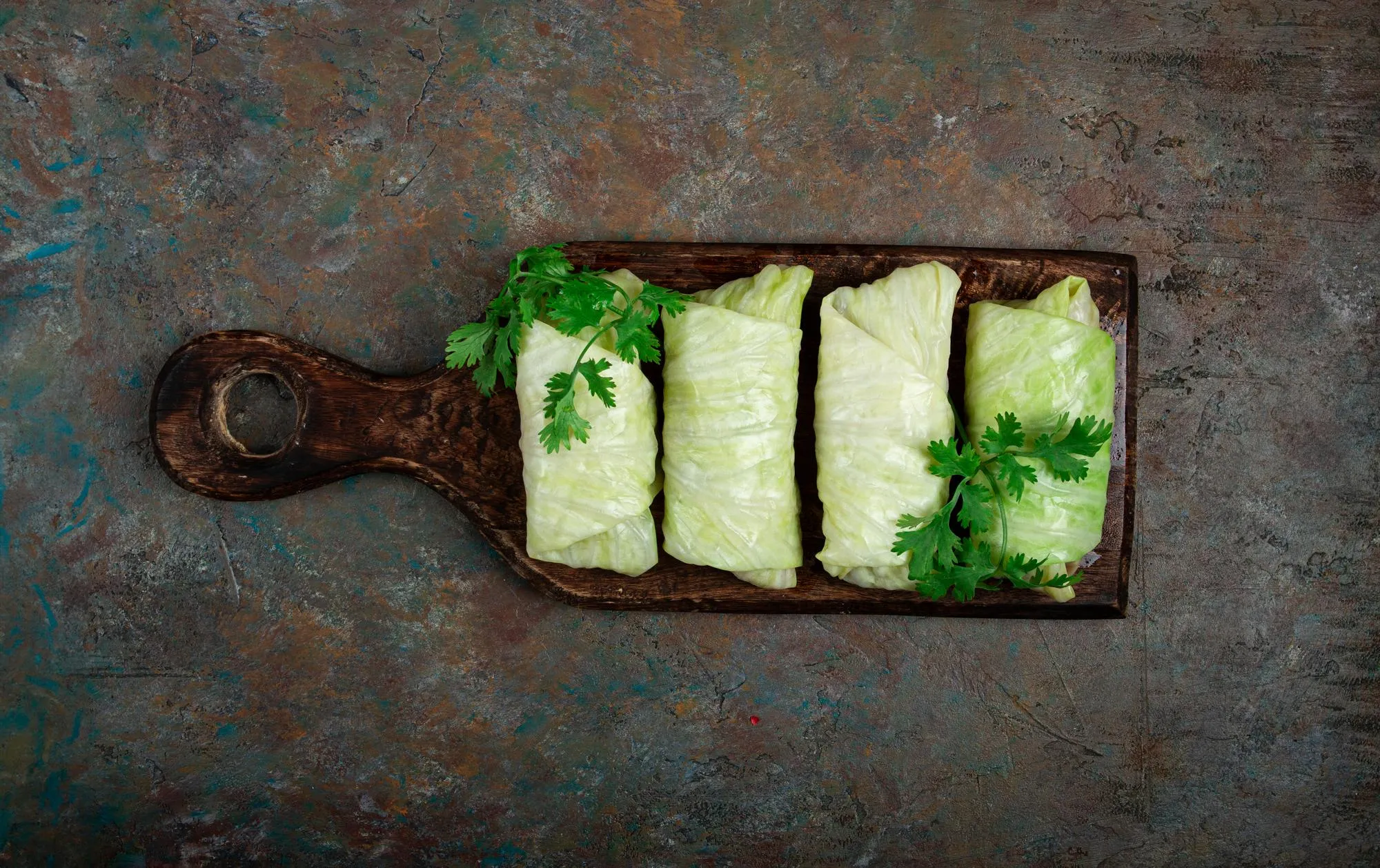raw cabbage rolls not cooked with minced meat top view without people in the spotlight
