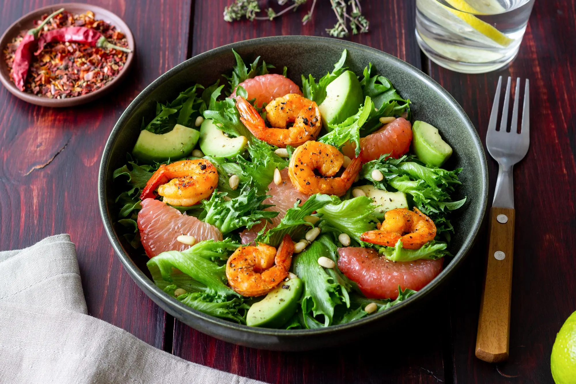 Salad with shrimp grapefruit avocado and nuts Healthy eating Diet