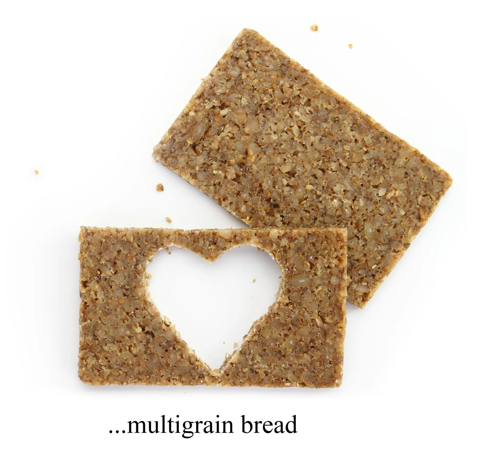 Two multigrain slices of bread with cut out shape of heart isolated on white