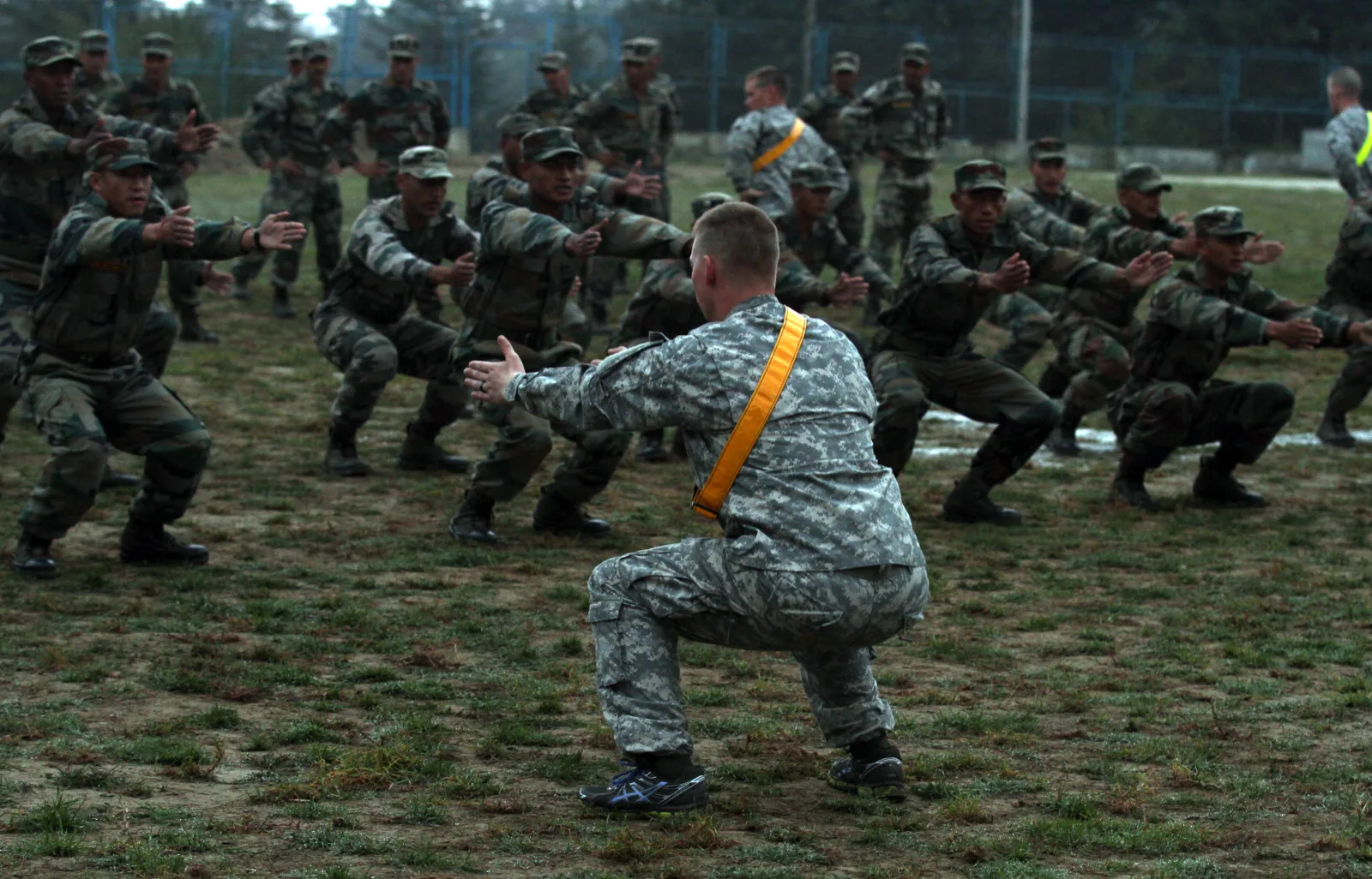 U.S. Soldiers from 5th Squadron, 1st Cavalry Regiment 1st Stryker Brigade Combat Team, 25th Infantry Division and soldiers with the Indian Army’s 2nd Battalion, 9th Gurkha Rifles perform physical fitness together Sept. 20 at Ranikhet Cantonment, Uttarakhand, India as part of exercise Yudh Abhyas 14. The physical training portion of the exercise has included yoga, the U.S. Army’s Physical Readiness Training, an obstacle course and running in the Himalayas, where Ranikhet Cantonment is located. YA 14 is a U.S. Army Pacific-sponsored exercise is geared toward enhancing cooperation and coordination through training and cultural exchanges, which help build skills and relationships necessary during a peacekeeping operation. (Photo by Staff Sgt. Mylinda DuRousseau, 1/25 SBCT Public Affairs)
