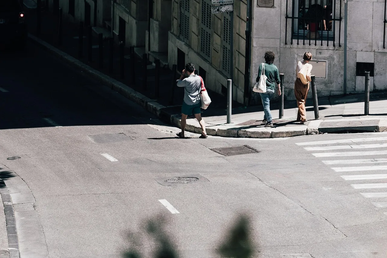 pedestrian, walking, sidewalk, pavement, city, crosswalk, street, road, pedestrian, walking, walking, sidewalk, sidewalk, sidewalk, sidewalk, sidewalk, city, crosswalk, crosswalk, street, street, street, road, road
