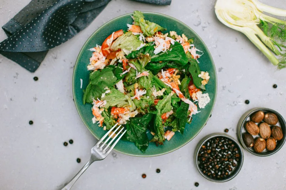 A delicious and healthy seafood salad with fresh mixed greens and vegetables, perfect for a nutritious meal.
