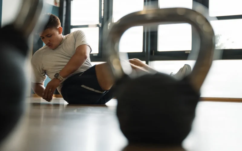 U.S. Air Force Airman 1st Class Baldemar Campos, 86th Maintenance Operations maintenance scheduler, performs an abdominal exercise to strengthen his core muscles inside the Southside Fitness Center at Ramstein Air Base, Germany, June 11, 2026. Consistent physical conditioning helps Airmen maintain their strength, endurance and combat readiness required to execute operations across the globe. (U.S. Air Force photo by Airman 1st Class Paden Henry)