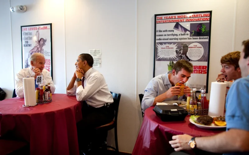 President Barack Obama and Vice President Joe Biden wait for their lunch during an outing to Rays' Hell Burger in Arlington, Va., May 5, 2009.