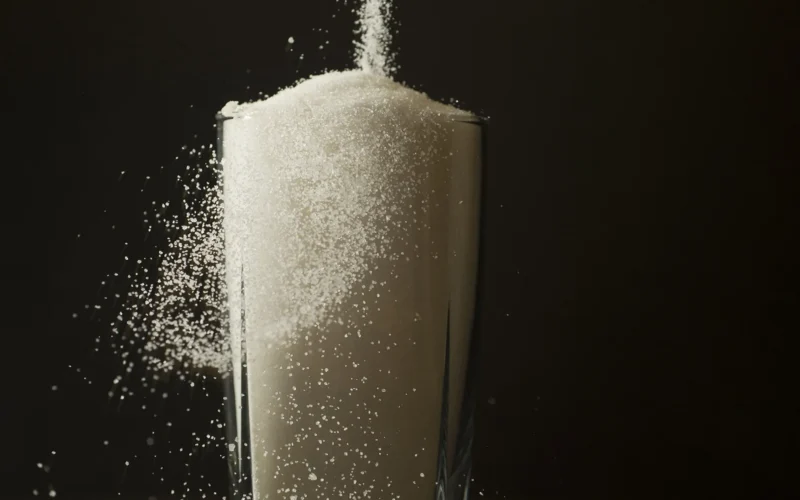 Soft drinks contain more sugar than people think. An average 12-fluid ounce can of soda has 40 grams of sugar, or the equivalent of 20 sugar cubes. According to the U.S. Department of Health and Human Services, Americans should try to limit the amount of sugar intake as part of a healthy and balanced nutritional plan.