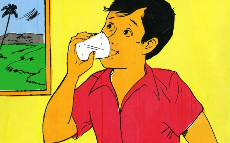 Drawing of a boy around 10+ years old, slightly dark Indian skin. Holding a glass and drinking from it. He is inside a house. Part of Community health education on the need to boil untreated water before using it.Part of a series of health education material developed for use around Vellore, India and made available for anyone to use.