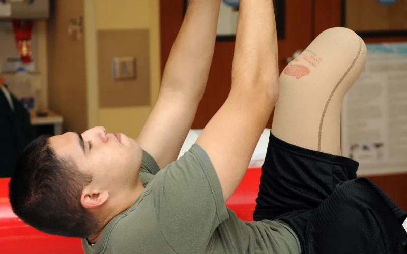 SAN DIEGO (Nov. 8, 2010) Marine Sgt. Julian P. Torres, a patient at Naval Medical Center San Diego, performs core-strengthening exercises with a medicine ball during a physical therapy session at the Comprehensive Combat and Complex Casualty Care facility. (U.S. Navy photo by Mass Communication Specialist 2nd Class Chelsea A. Radford/Released)