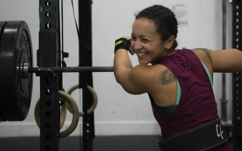 U.S. Air Force Staff Sgt. Patricia West, 52nd Command Post senior emergency actions controller, relaxes after a powerlifting workout at Spangdahlem Air Base, Germany, Jan. 16, 2019. Physical exercise, such as lifting weights, damages muscle fibers and creates a feeling of soreness, but during rest periods muscles have time to recover in stronger formations and increase in size. (U.S. Air Force photo by Airman 1st Class Jovante Johnson)