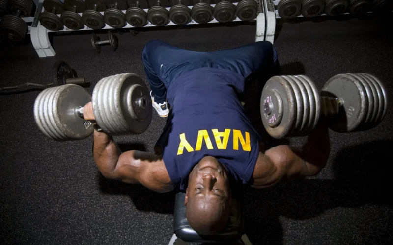 PEARL HARBOR, Hawaii (Oct. 17, 2007) - Chief Mineman Kevin Sperling, an officer recruiter at Navy Recruiting Processing Station Honolulu, presses two 105-pound dumbbells to exercise his chest during a workout in Bloch Arena Gym at Naval Station Pearl Harbor. Sperling has been in the sport of bodybuilding for the past 10 years and was proclaimed "Mr. Hawaii" in the 29th Hawaiian Islands Bodybuilding and Figure Championships held June 30. Most recently, he garnered a 10th place finish in the U.S.A. Body Building Championship, held in Las Vegas, July 27-28. U.S. Navy photo by Mass Communication Specialist 3rd Class Eric J. Cutright (RELEASED)