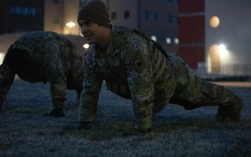 U.S. Army Staff Sgt. Ryan McCrum, assigned to U.S. Army Southern European Task Force, Africa (SETAF-AF), performs the push-up exercise during the Sgt. Zachary Tellier’s workout of the day as part of the monthly Lion’s Legacy event on Caserma Del Din, Vicenza, Italy, Feb. 2, 2024. The workout honors Tellier, who passed Sept. 29, 2007 of wounds sustained while on a ground patrol in Afghanistan. The Lion's Legacy series is a monthly competition designed to strengthen unit cohesion and camaraderie across SETAF-AF headquarters through team and individual physical fitness challenges. SETAF-AF provides U.S. Africa Command and U.S. Army Europe & Africa a dedicated headquarters to synchronize Army activities in Africa and scalable crisis response options in Africa and Europe. (U.S. Army photo by Spc. Kevin Eros)