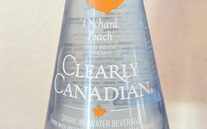 Bottle of Orchard Peach flavor Clearly Canadian sparkling water.
