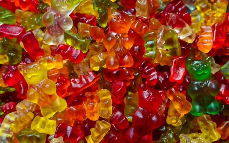 Vibrant close-up of multicolored gummy bears, perfect for candy lovers.